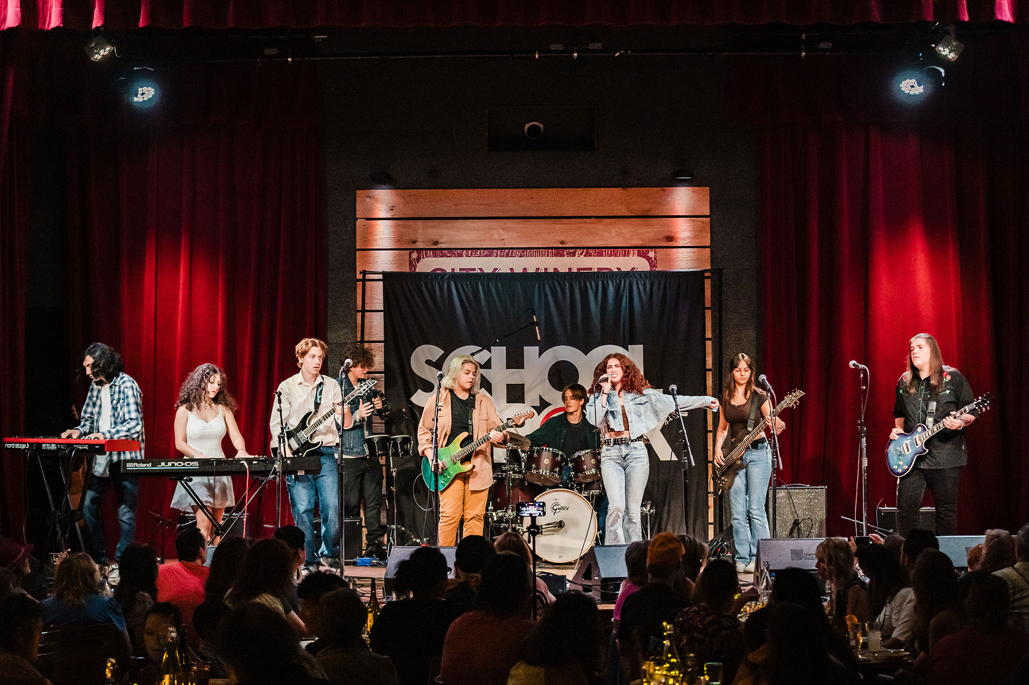 School of Rock students performing on stage