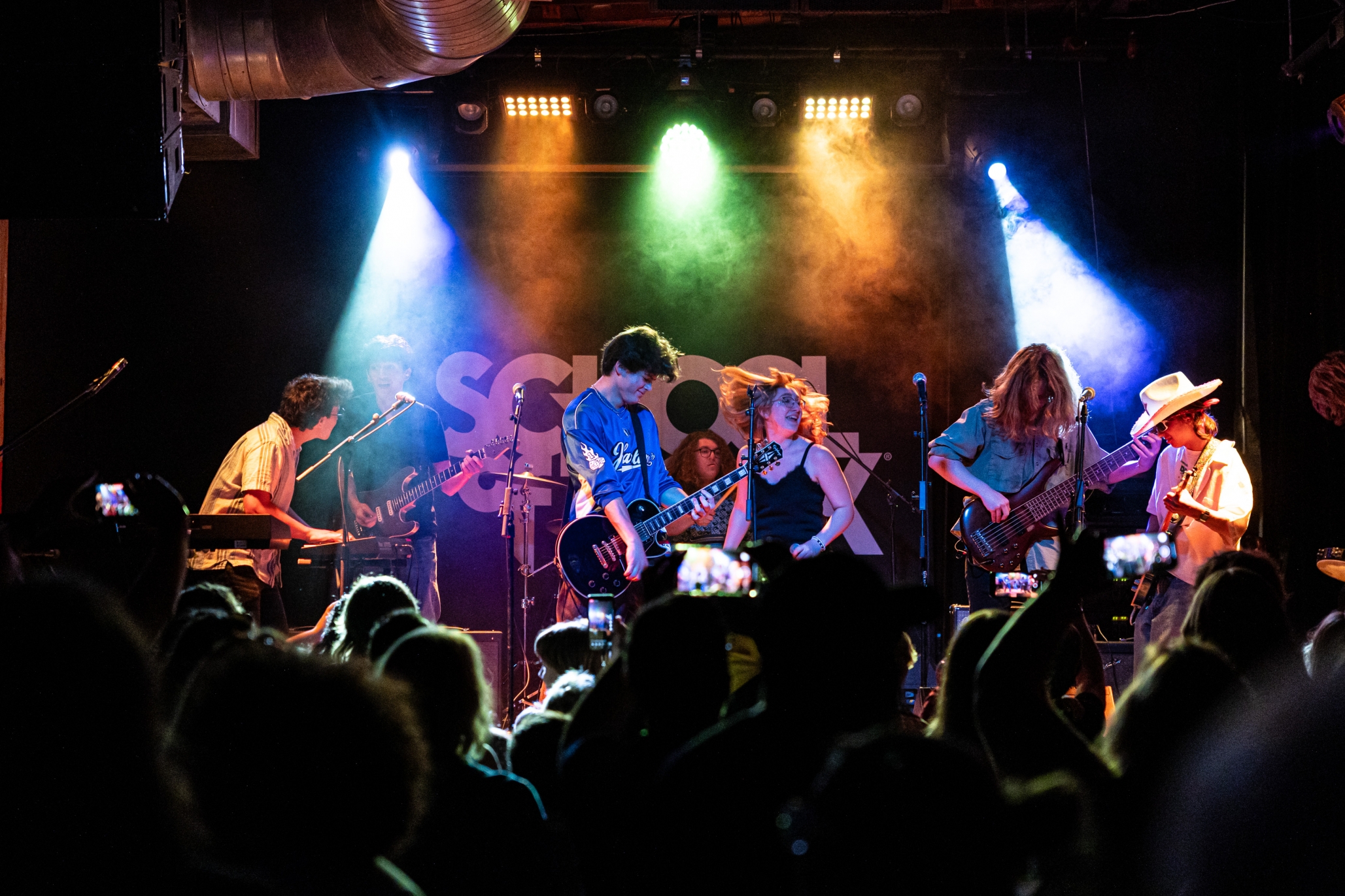 School of Rock Students Performing on Stage