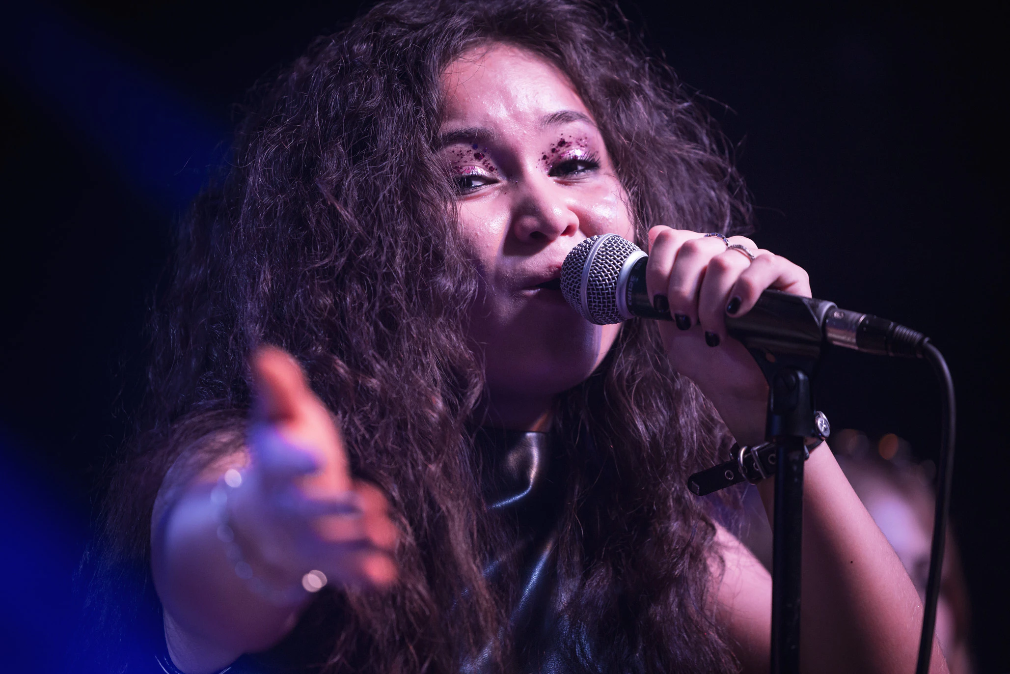 School of Rock Student Singing on Stage