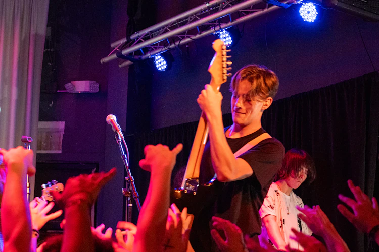 School of Rock Students Performing on Stage