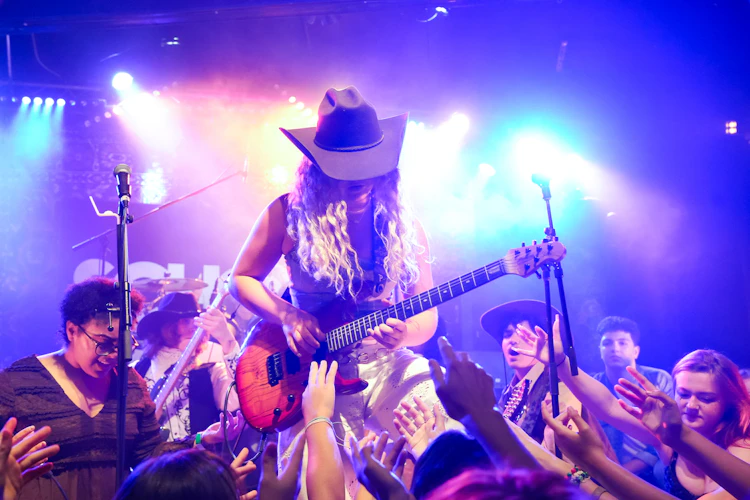 School of Rock Students Performing on Stage