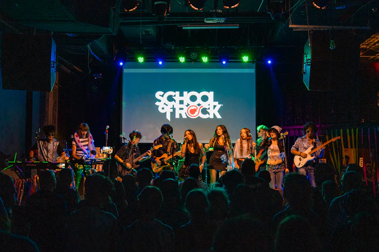 School of Rock Students Performing on Stage