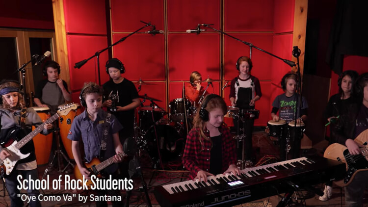 School of Rock students recording Oye Como Va by Santana in the studio