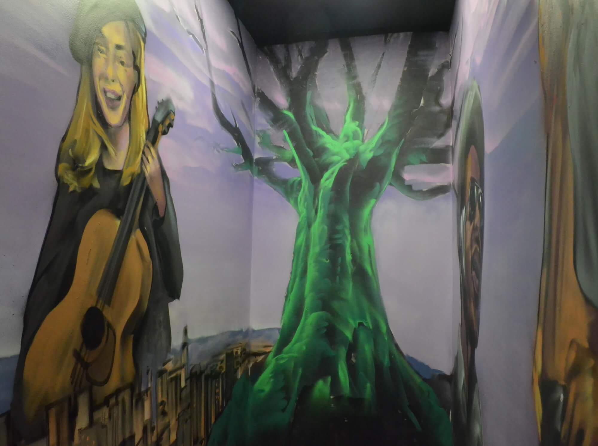 The outside of our venue space overlooks a mural of Joni Mitchell and the Tree of Life.