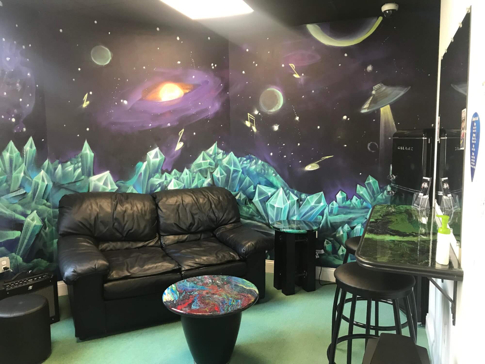 Our outer space green room/student lounge for practicing and pow wows is a great space.