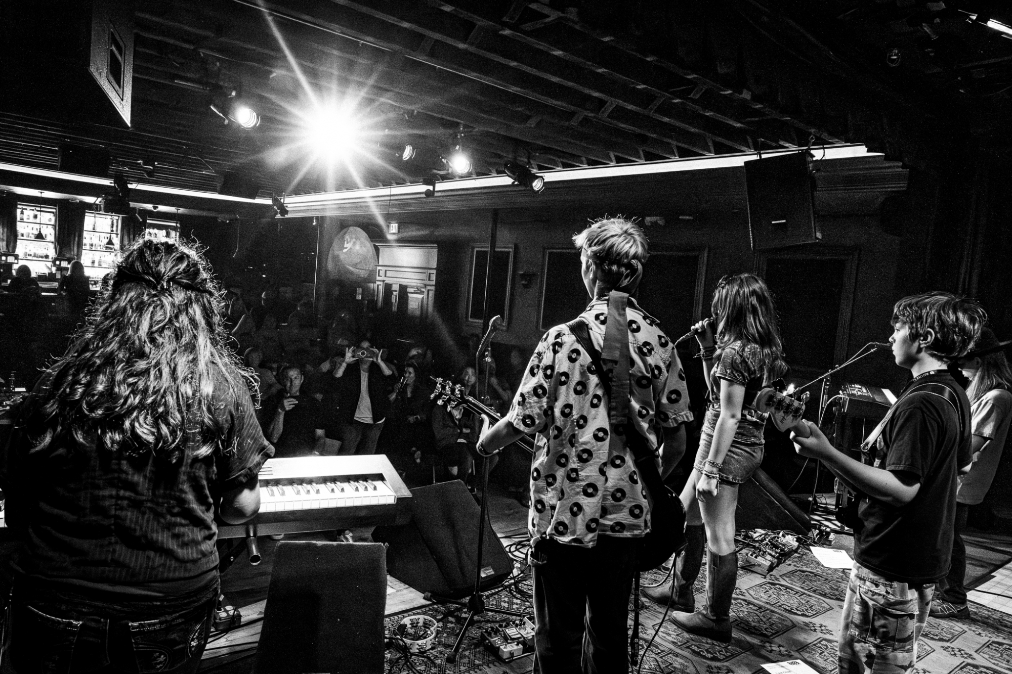 Learn to play live on stage with others at School of Rock.