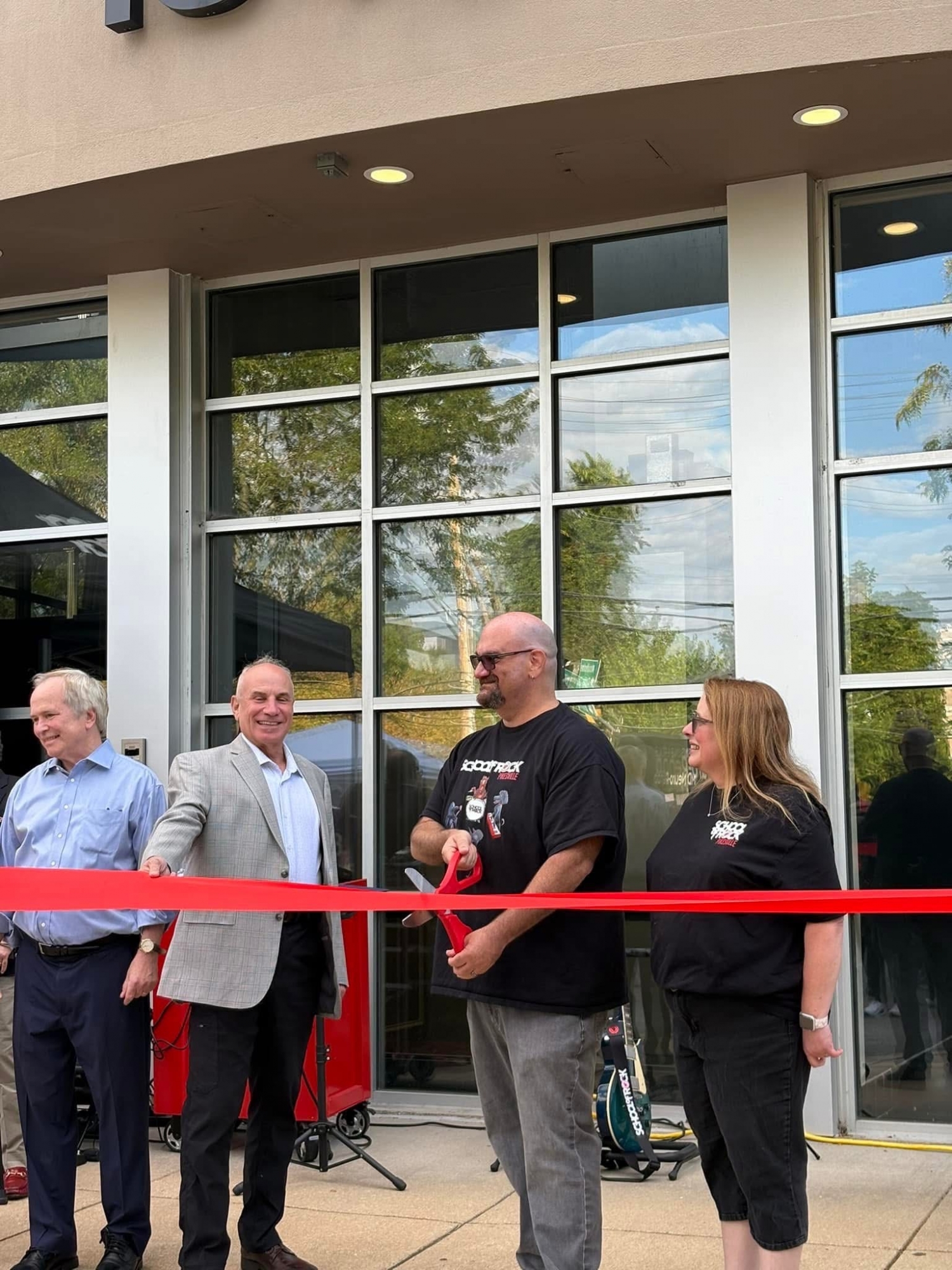 Ready to cut the ribbon for our Grand Opening!