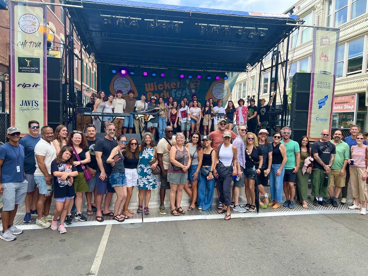 Chicago West House Band with their parents at Wicker Park Fest 2024. Community and family involvement is a hallmark of our program.