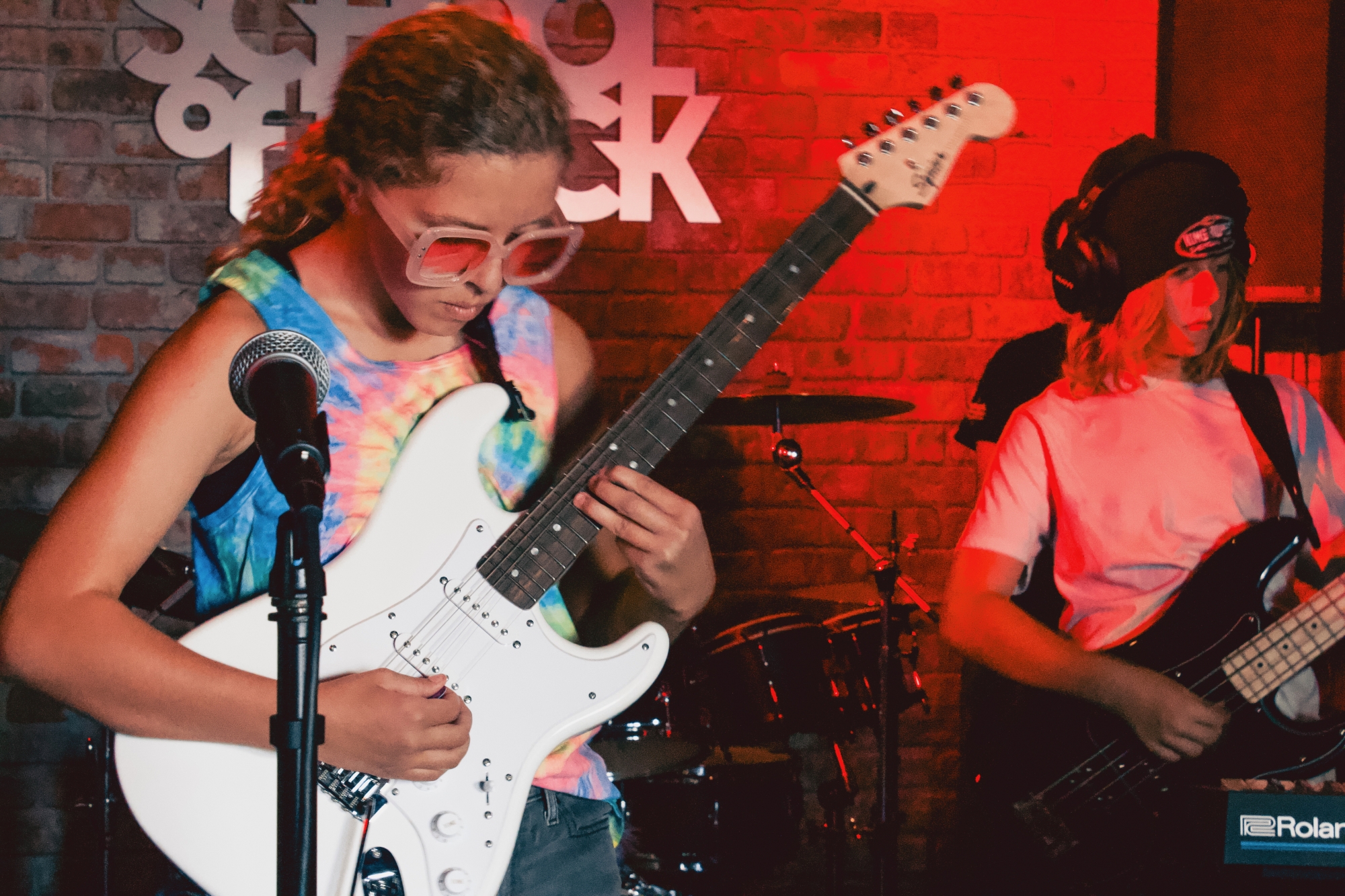 School of Rock's engaging programs help students have fun while developing essential social skills and building lasting connections in our supportive environment.
