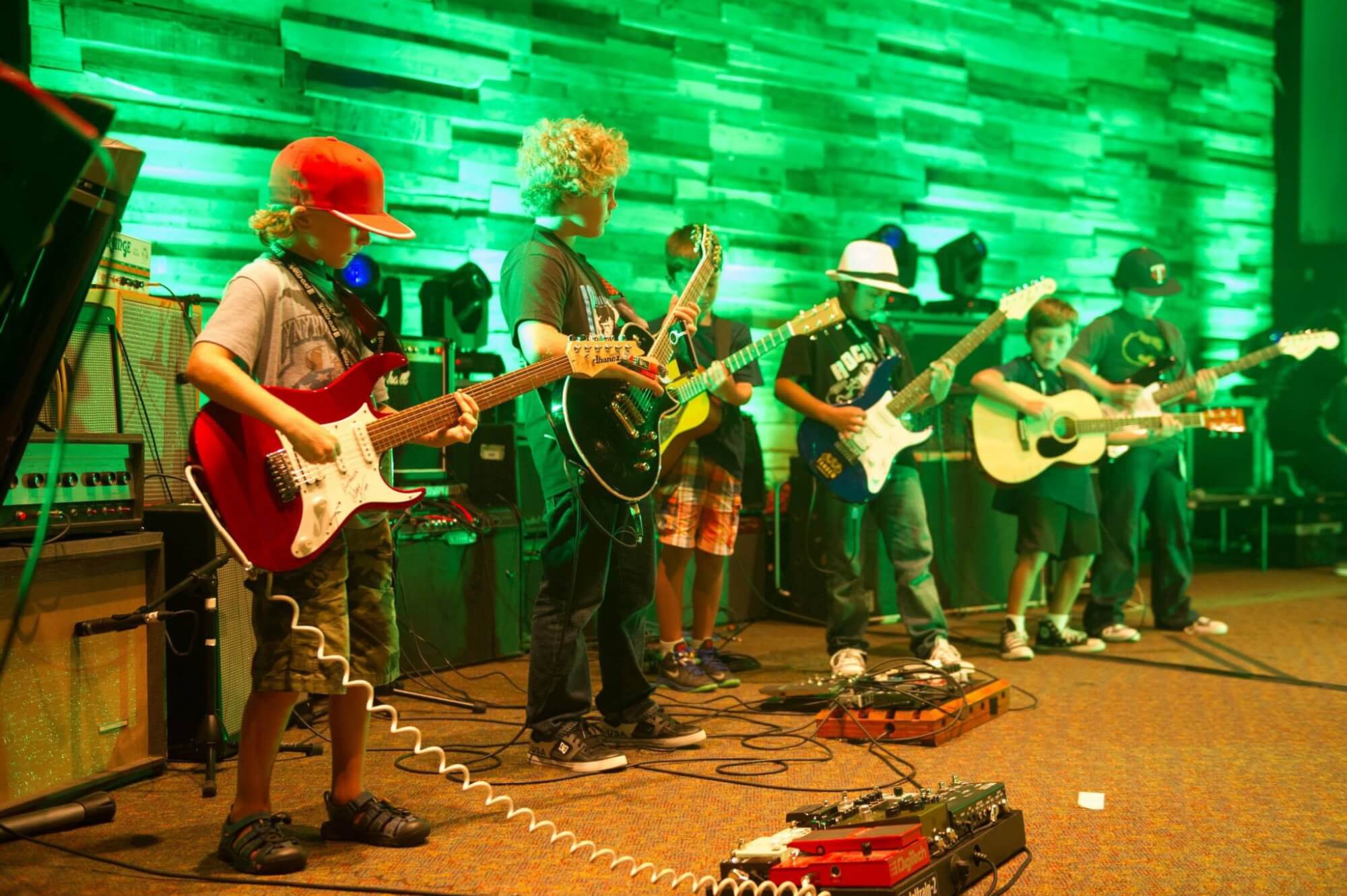 Guitar players perform at our Rock Camp finale.