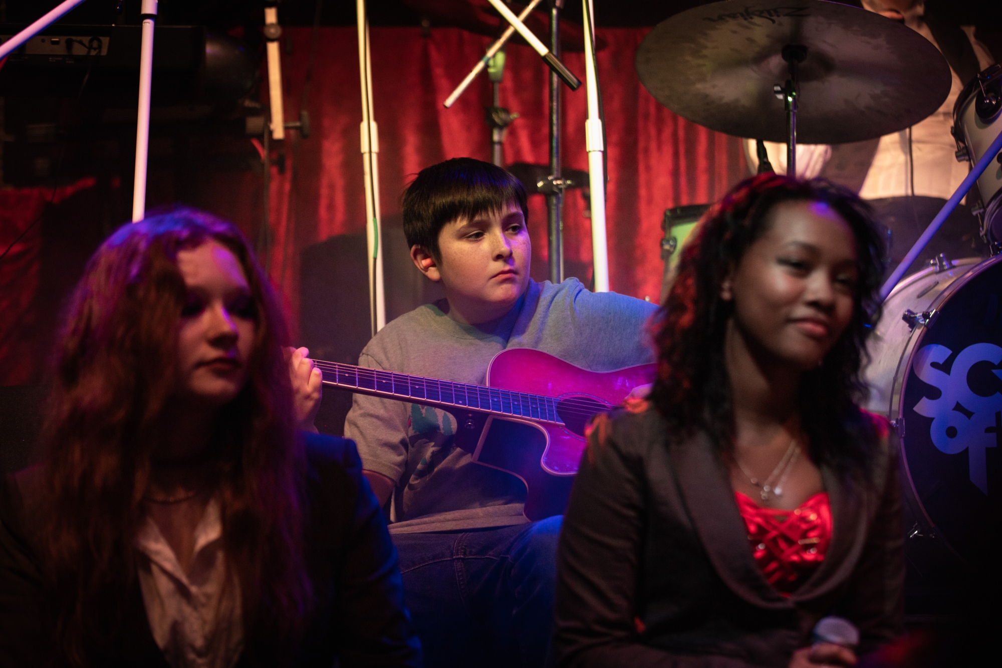 Learn to play live on stage with others at School of Rock.