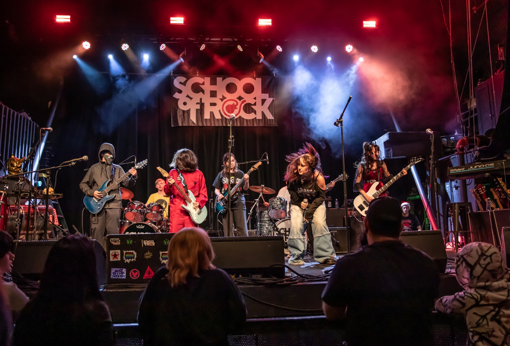 Performance Program students from School of Rock Loveland, premier Northern Colorado music school offering performance-based music lessons, rocking the stage at The Aggie Theatre!