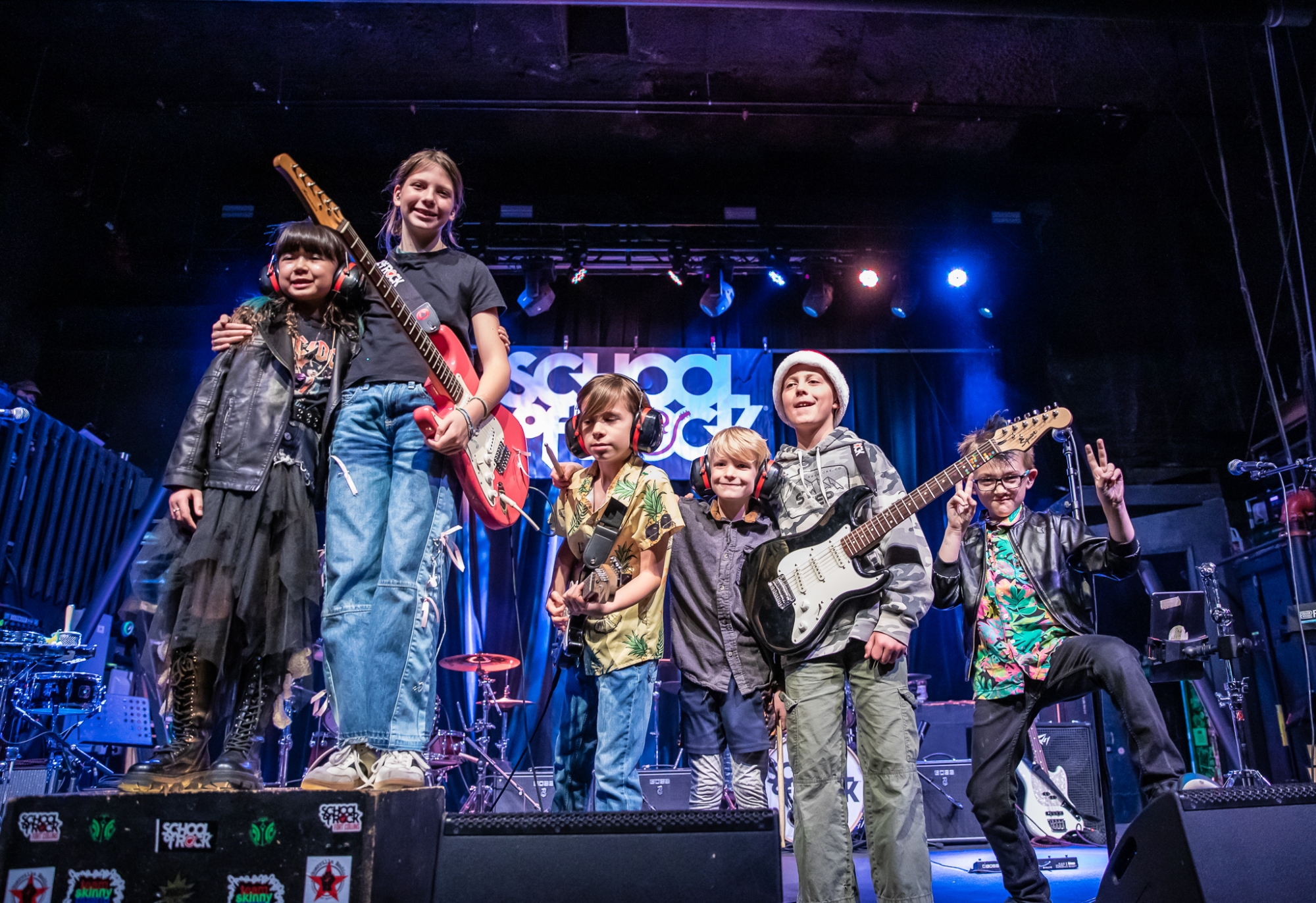 Performance Program students at School from Rock Fort Collins and Loveland, premier Northern Colorado music schools offering performance-based music lessons, rocking the stage at The Aggie Theatre!