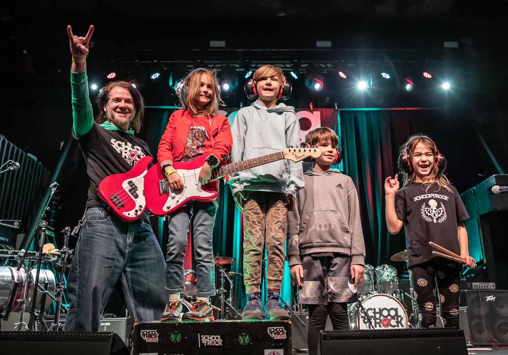 Rock 101 students at School from Rock Fort Collins and Loveland, premier Northern Colorado music schools offering performance-based music lessons, rocking the stage at The Aggie Theatre!