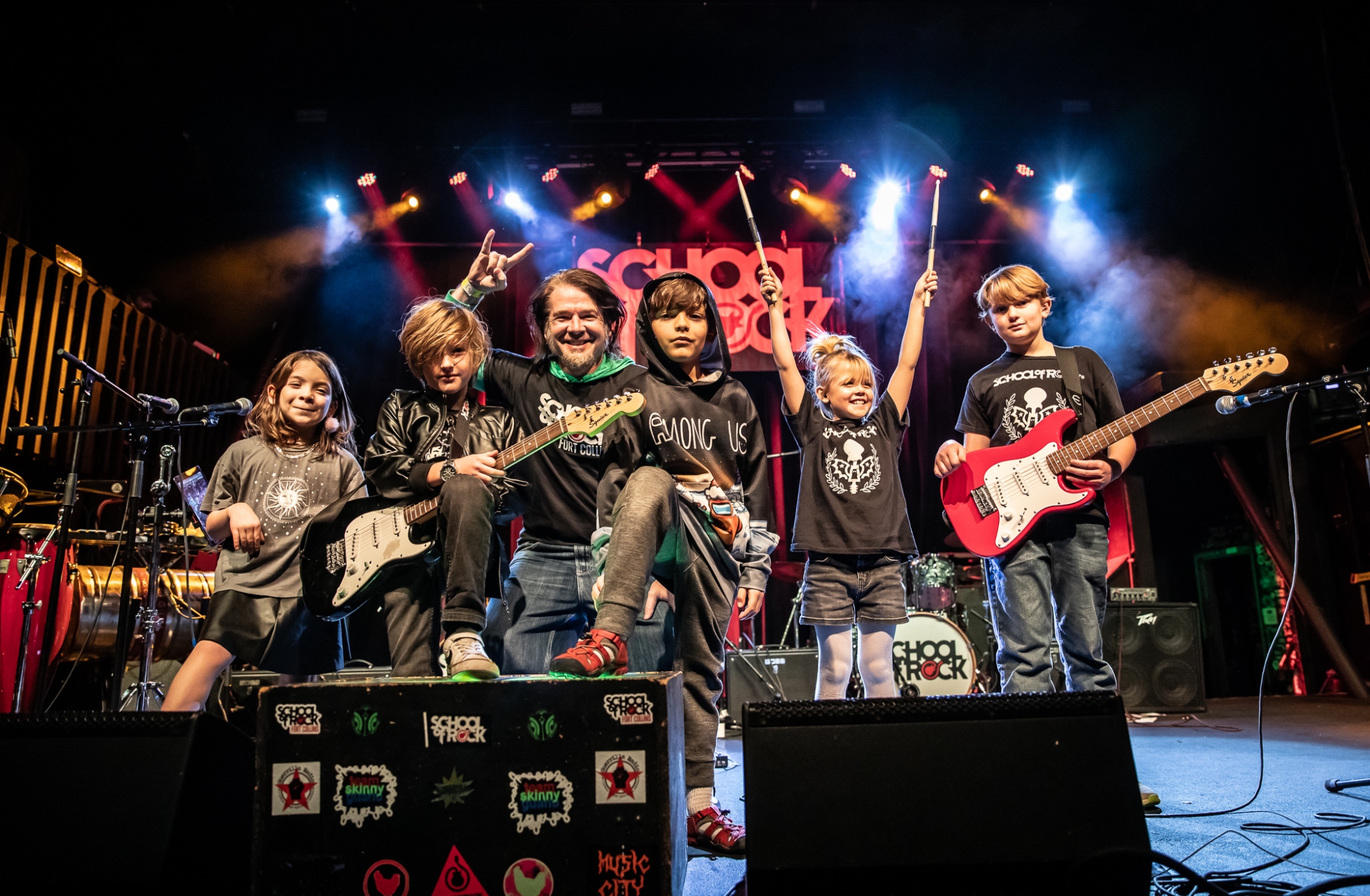 Rock 101 students from School of Rock Loveland, premier Northern Colorado music school offering performance-based music lessons, rocking the stage at The Aggie Theatre!