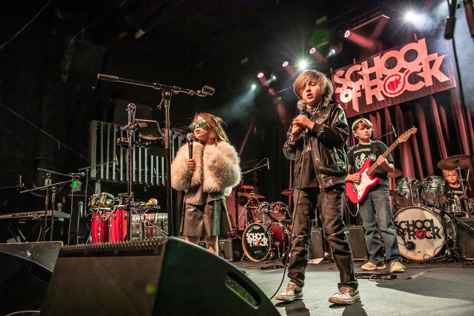 Rock 101 students from School of Rock Fort Collins and Loveland, premier Northern Colorado music schools offering performance-based music lessons, rocking the stage at The Aggie Theatre!