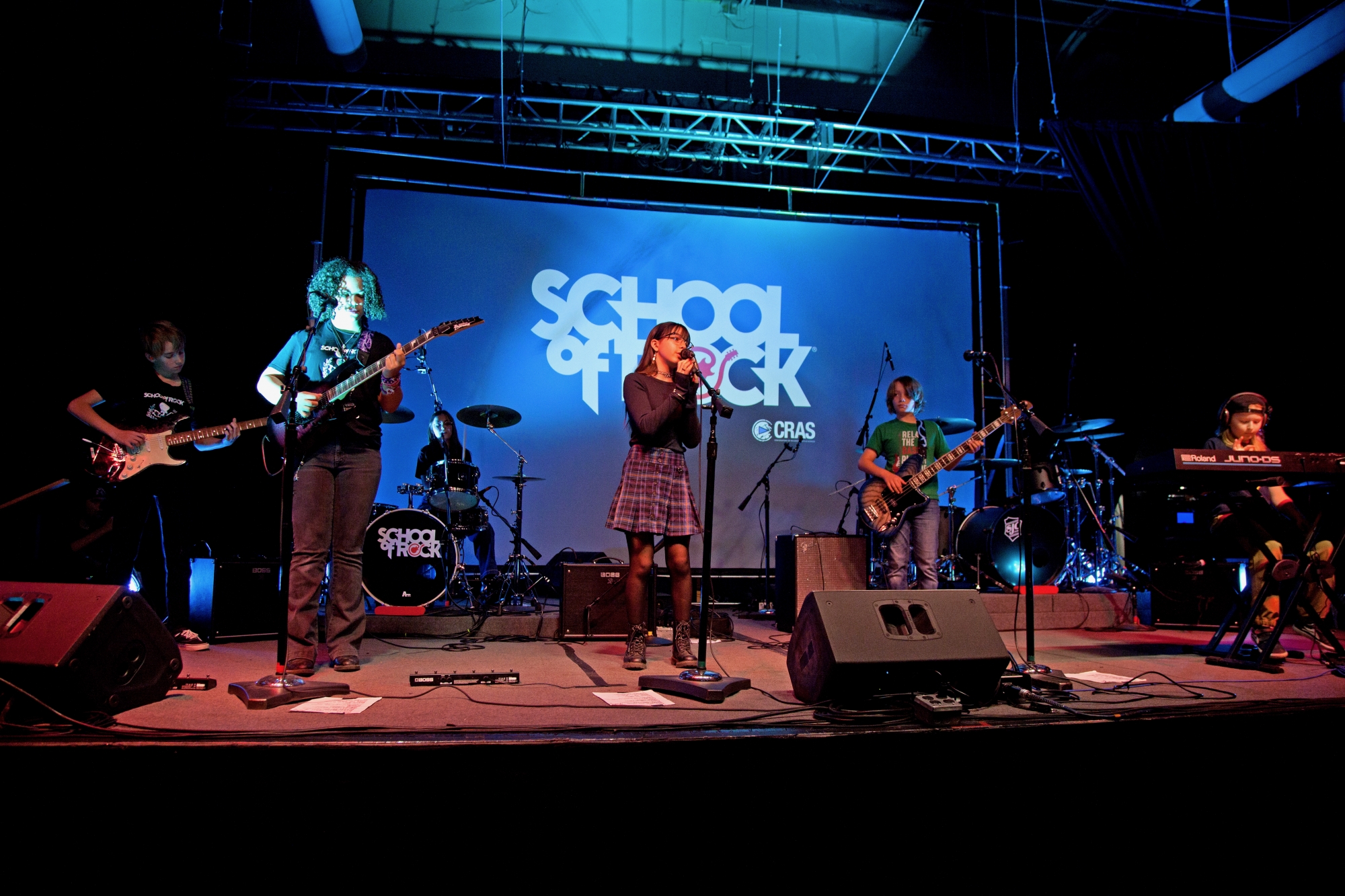 Experience the thrill of performing on a big stage with professional production! (Photo by Lisa Johnson Rock Photographer)