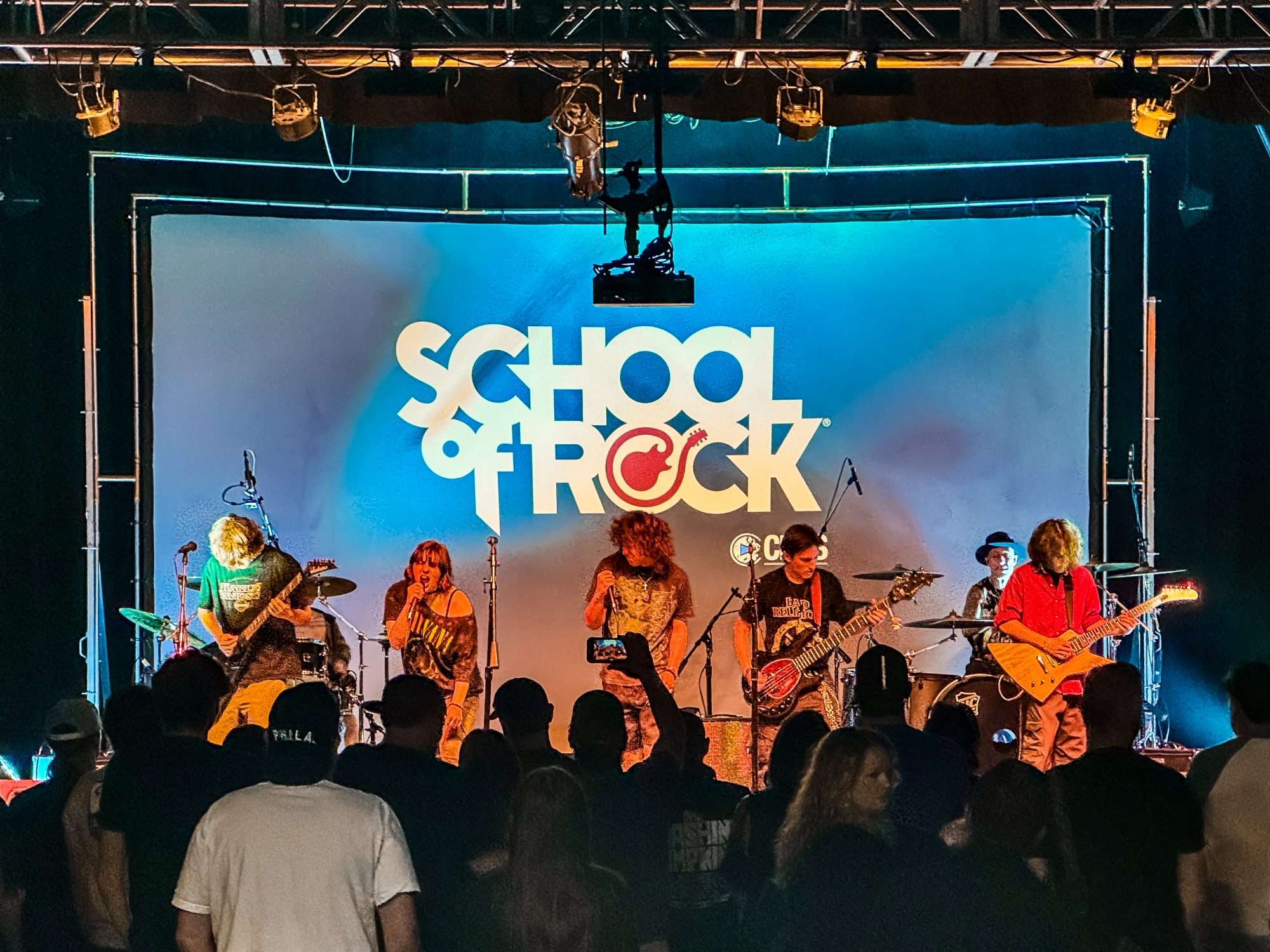 Learn to play live on stage in front of an audience!