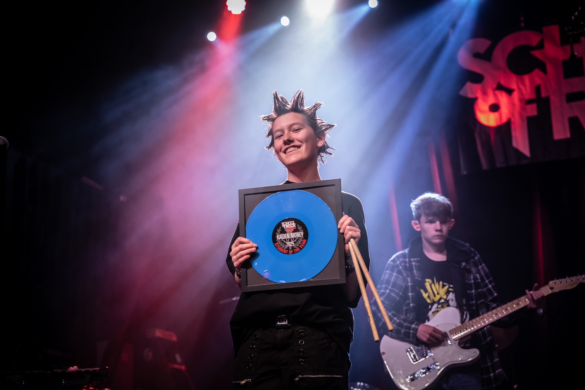 Student of the Year from School from Rock Fort Collins and Loveland, premier Northern Colorado music schools offering performance-based music lessons, on stage at The Aggie Theatre!