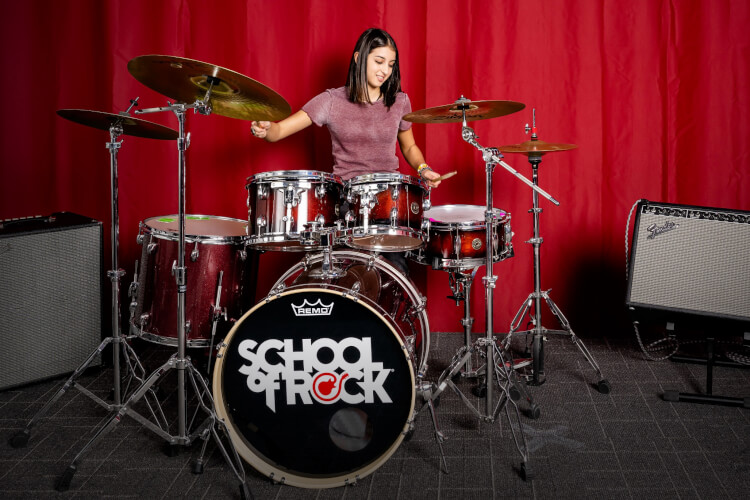 School of Rock student playing the drums