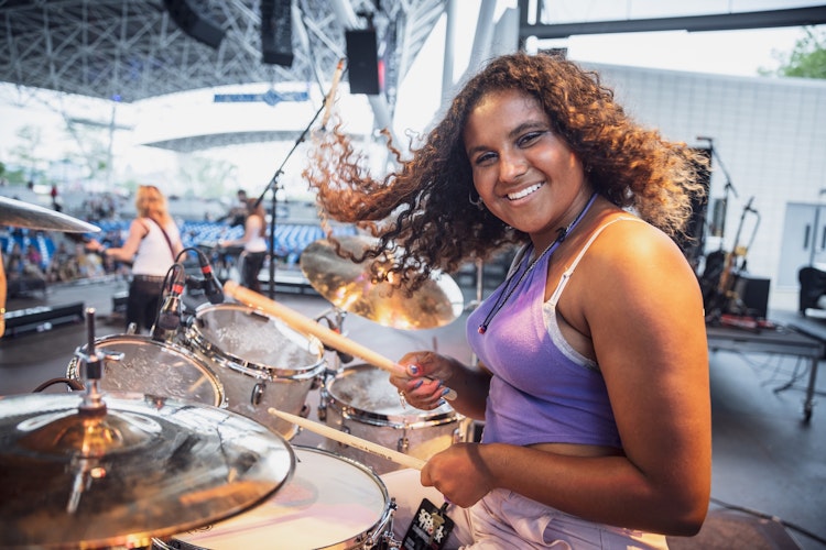 School of Rock Students Performing on Stage