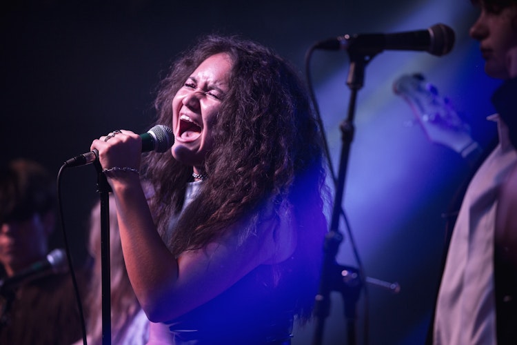School of Rock Students Performing on Stage