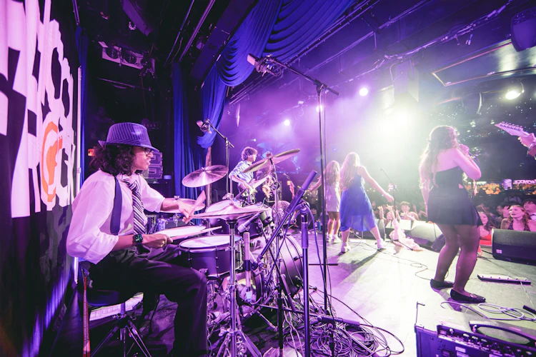 School of Rock Students Performing on Stage