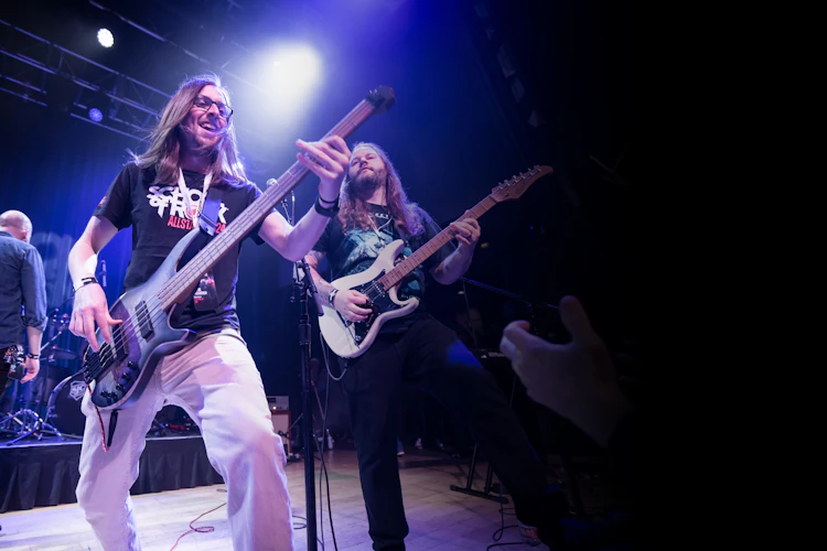 School of Rock Employees Performing on Stage