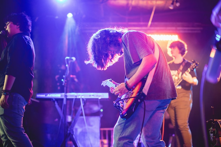 School of Rock Students Performing on Stage
