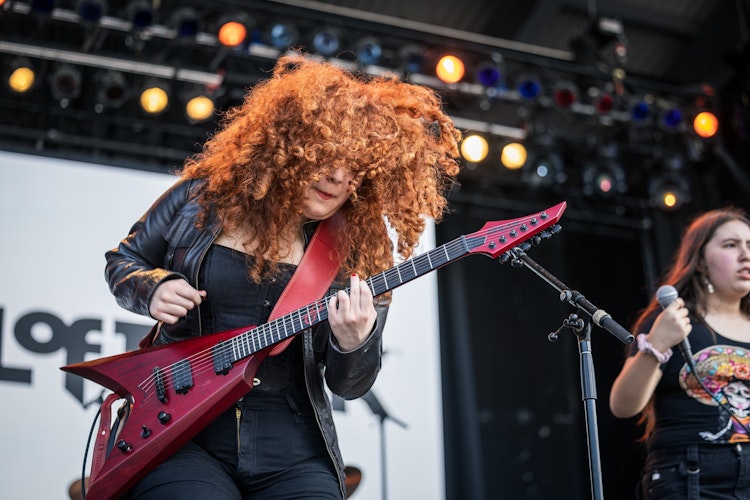 School of Rock Students Performing on Stage