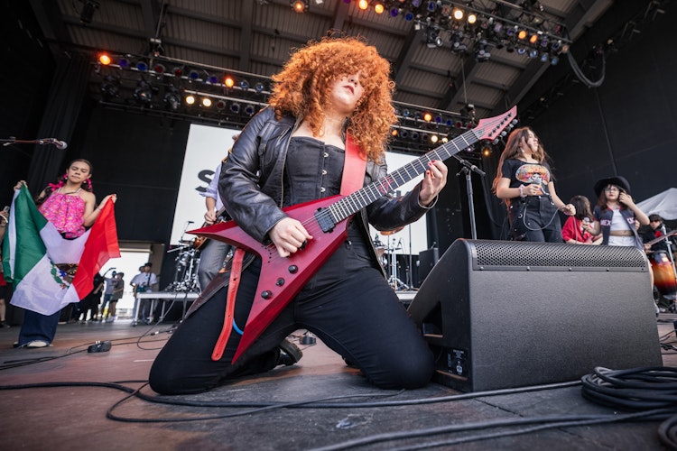 School of Rock Students Performing on Stage
