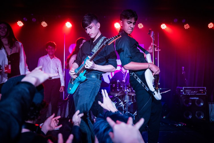 School of Rock Students Performing on Stage