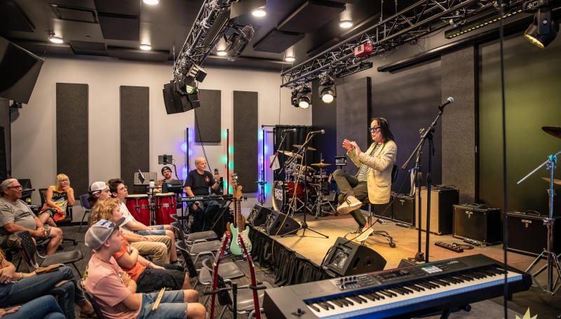 Todd Rundgren visiting School of Rock Loveland speaking with music students