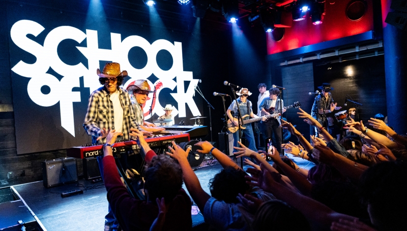 School of Rock Students Performing on Stage