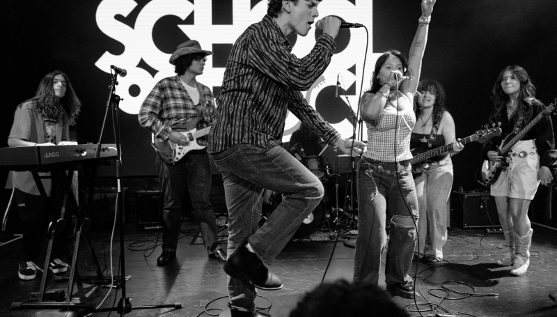 School of Rock Students Performing on Stage