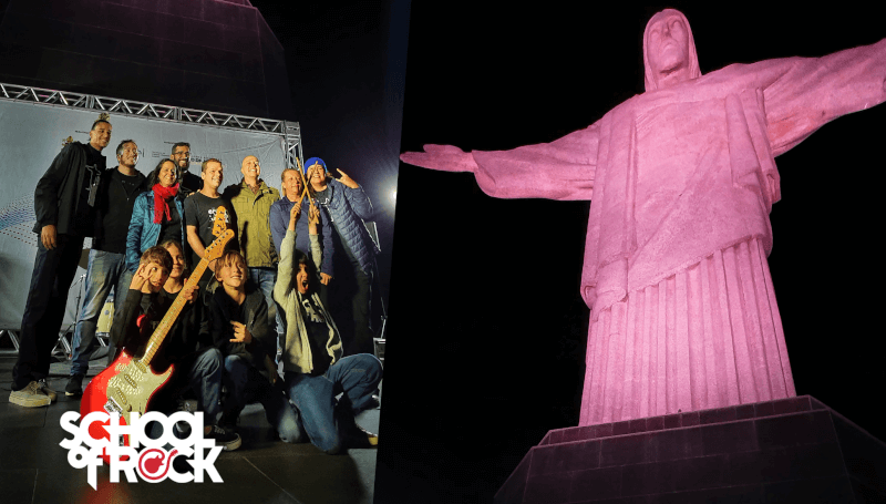 Cristo Redentor iluminado no Rio de Janeiro, cidade maravilhosa. Alunos School of Rock do programa Rock 101. Guitarra vermelha. 