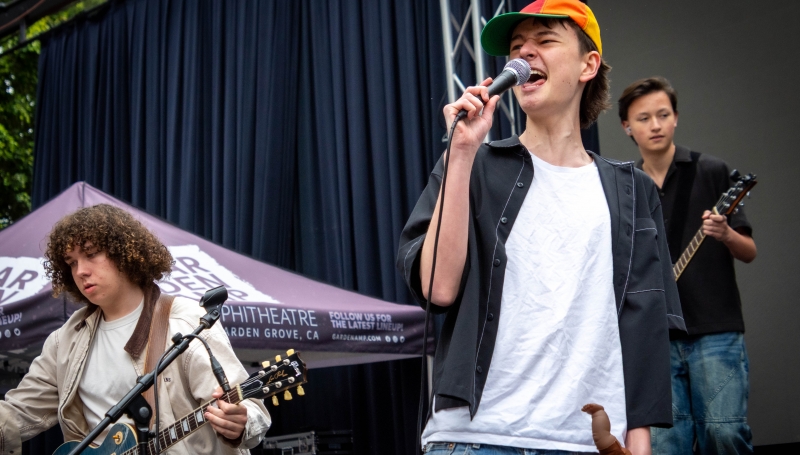 School of Rock students perform on the Main Stage at the Garden Amp