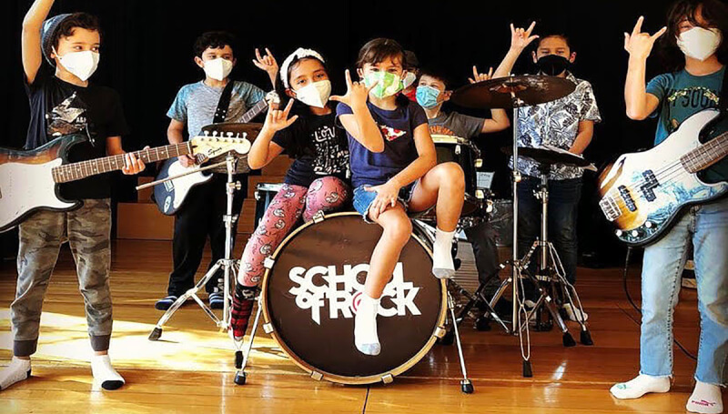 School of Rock students learning how to play music and preparing for show in Colorado Springs