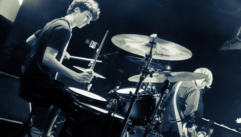 School of Rock Buckhead student drummer performing live with a band in Atlanta