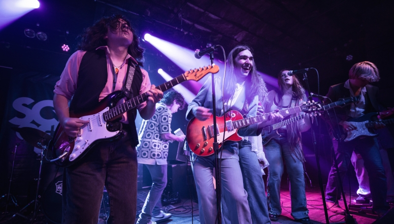 School of Rock Students Performing on Stage