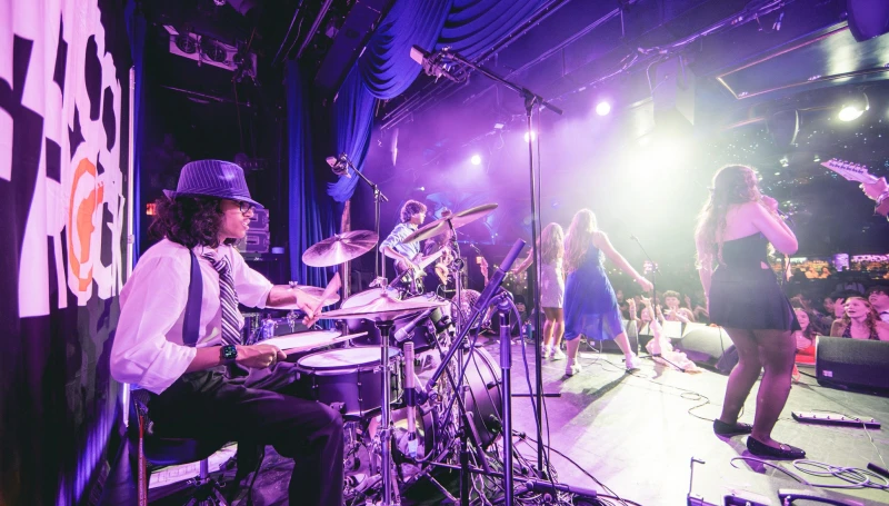 School of Rock Students Performing on Stage