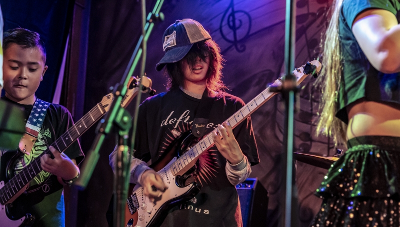 Two guitar players playing during Led Zeppelin