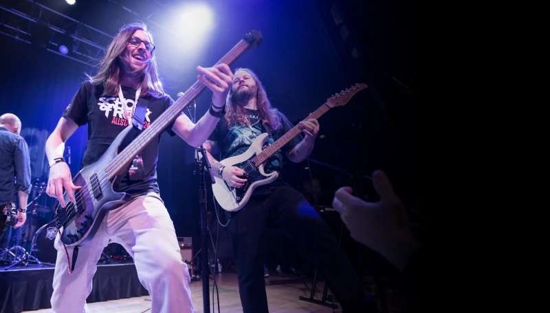 School of Rock Employees Performing on Stage