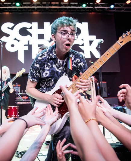 Students play shows in real rock venues around the country