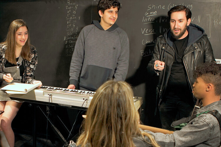 School of Rock students in songwriting class