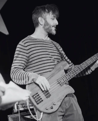 Show Director, Bass Guitar Teacher, Audio Engineer, Rock 101 Director, Grad School Director Michael P.