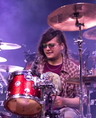 Drum Teacher, Guitar Teacher, Bass Guitar Teacher Kyler Chow 