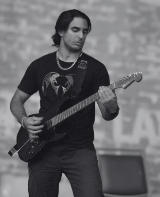Rookies Coordinator, Guitar Teacher, Keyboard + Piano Teacher, Bass Guitar Teacher Ash Shahidi
