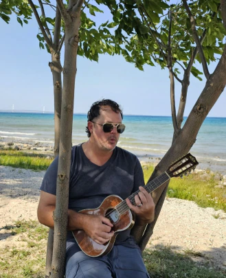 Guitar Teacher, Bass Teacher, Keyboard + Piano Teacher Brandon Malik