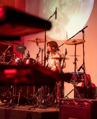 Rock 101 Director, Show Director, Drums Teacher Brooke McAfee